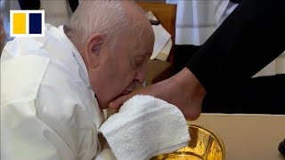 Pope Francis washes the feet of 12 female inmates in break with Holy Week past