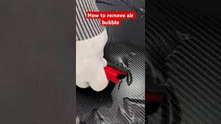 How to remove air bubble from carbon fibre car vinyl wrap #carbonfibre #carwrap #car #automobile