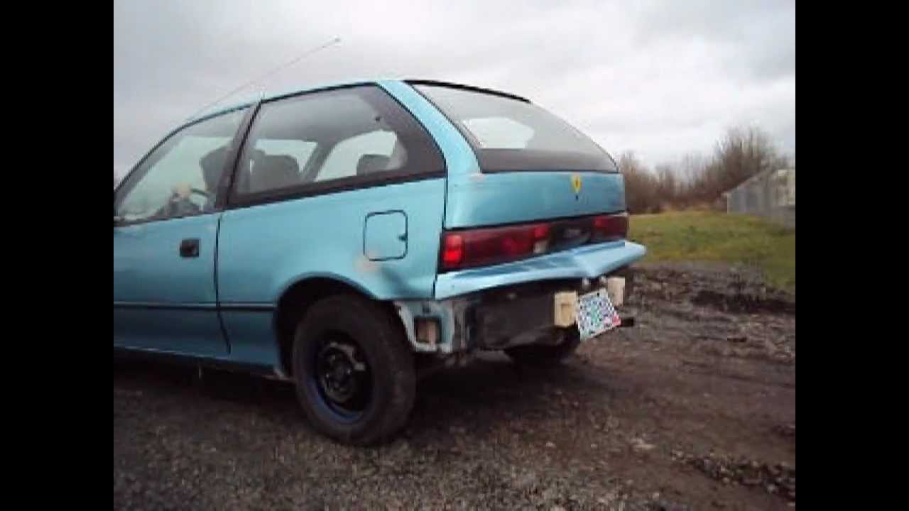 geo metro with titanium exhaust - YouTube