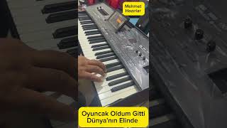 Oyuncak Oldum Gitti Dünyanın Elinde Resimi