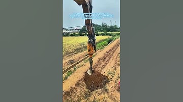 Precision Power: Excavator Operators Digging Holes for Utility Pole Installation