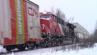 Friendly Hogger on a Huge Stack Train CN 121 w/DPU & Inspection Car at Berry Mills, NB in the Snow