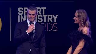 Gareth Bale receives the Oustanding Contribution to Sport Award at the FEVO Sport Industry Awards