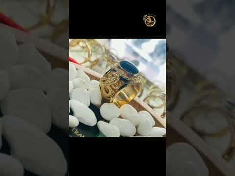 Nhẫn phong thủy 2 Rắn vàng 18K chầu ngọc xanh đen