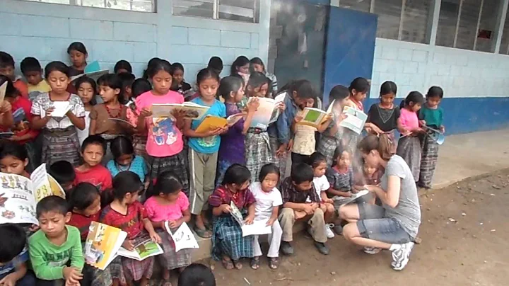 Kids reading new books, Guatemala, 2012
