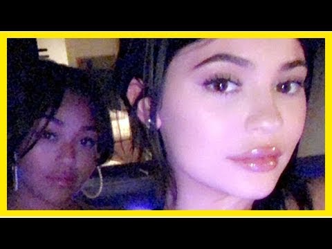 Kylie Jenner Takes A Sexy Hot Tub Selfie That Shows Off Her Toned Stomach & Post-Baby Boobs