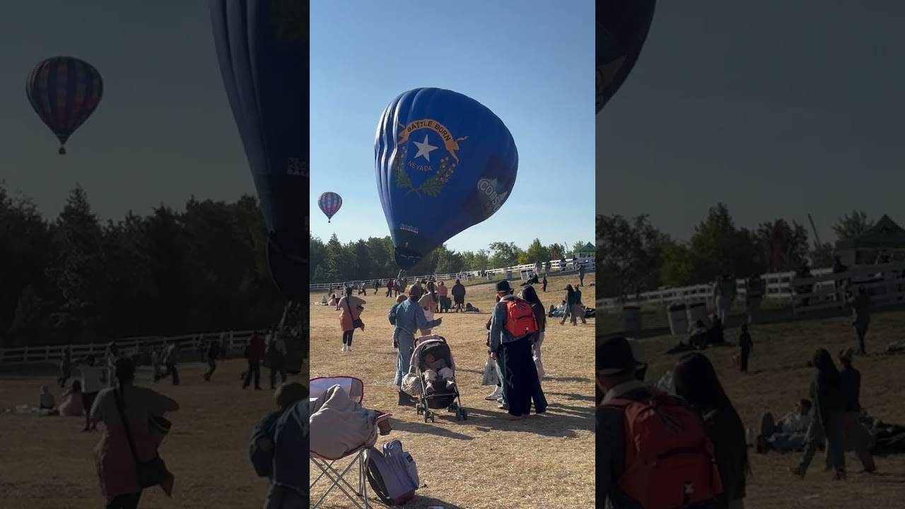 Толпа вскочила в толпу, когда воздушный шар приземлился боком.