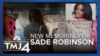 Investigators return to accused killer's home; Loved ones of Sade create memorial