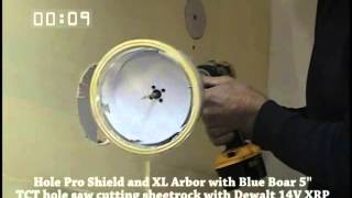 Hole Pro Dust Shield with Blue Boar Hole cutter cutting 6