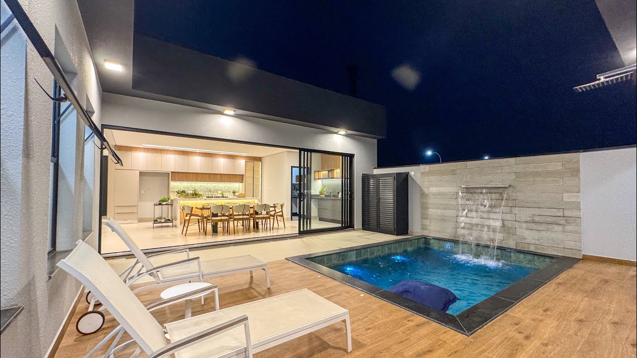 O Brilho da Noite em uma Casa Moderna com Piscina e Energia Solar | Indaiatuba/SP