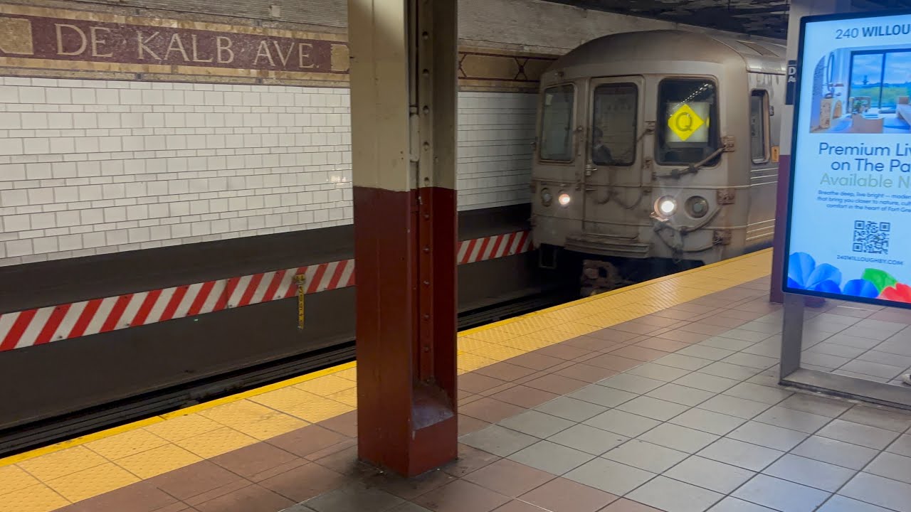 BMT Manhattan bound B/Q/R Local and D/N Express trains at DeKalb Ave 
