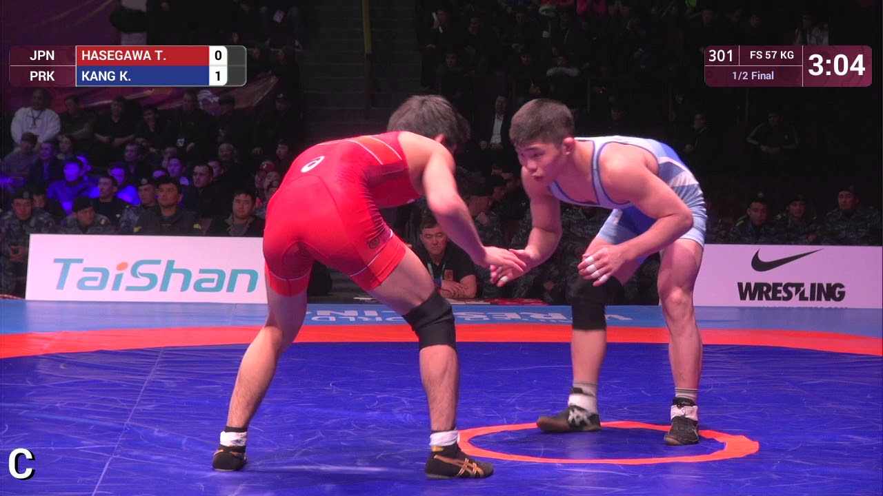 1/2 FS - 57 kg: T. HASEGAWA (JPN) v. K. KANG (PRK)