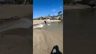 Breaking A Sand Berm Connects River To Ocean