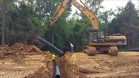 CLAY VS. CRUSHED GRAVEL; Installing a culvert pipe; Water erosion & what to consider.