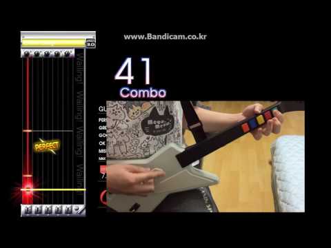 playing-guitarfreaks-with-guitar-hero-controller.