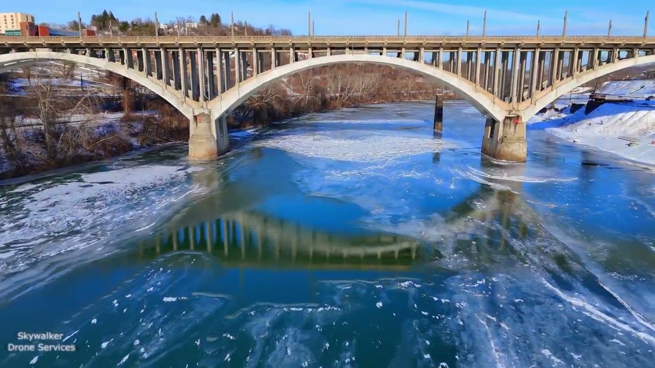 Flying over a frosty Monongahela River toward the Robert H. Mollohan-Jefferson Street Bridge