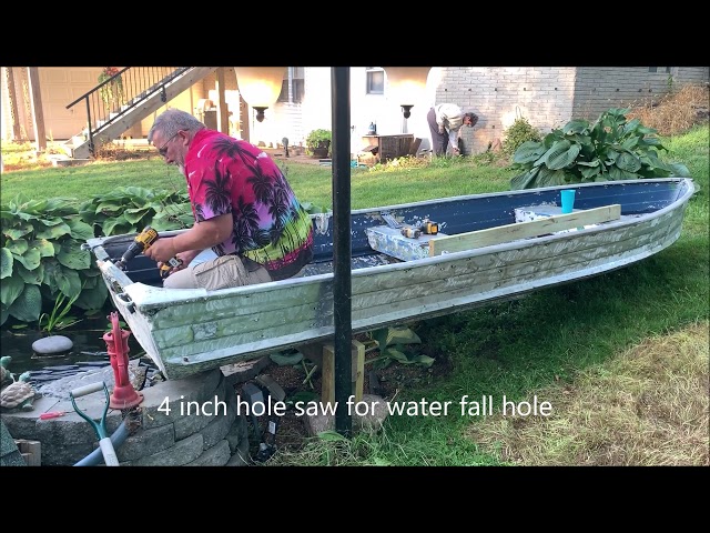 Koi Pond gets a Boat feature water fall and fish habitat 