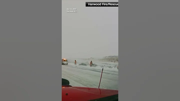 Dashcam Video: Pickup Nearly Hits 2 North Dakota Firefighters in Blizzard