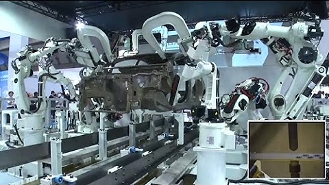 Car Body Assembly at iREX2015 - Kawasaki CX210L, BX300L, BX100S & BA006N robots