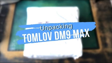 Unpacking TOMLOV DM9 MAX