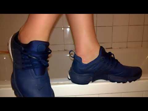 Shoeplay and shower in her Nike Presto Utility