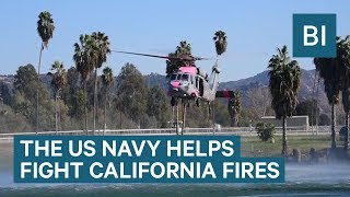 The us navy helped fight wildfires in san diego county with aerial
water drops. have been raging california, prompting mass evacuations
and caus...