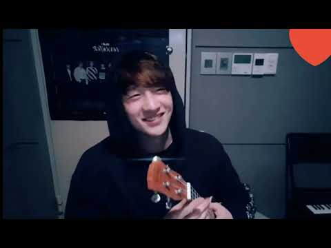 Chan playing ukulele