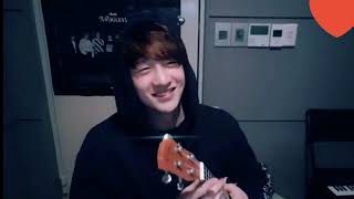 Chan playing ukulele