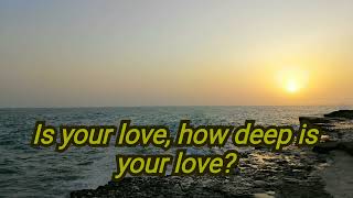 Vignette de la vidéo "Bee Gees - How deep is your love (Lyrics)"