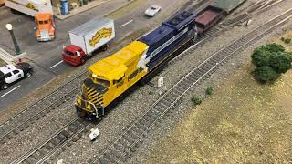 EMD SD70M with a long MoW train