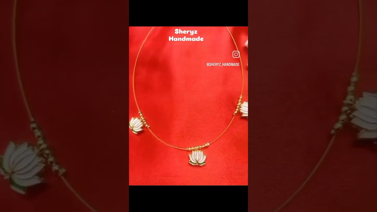 white lotus neckchain