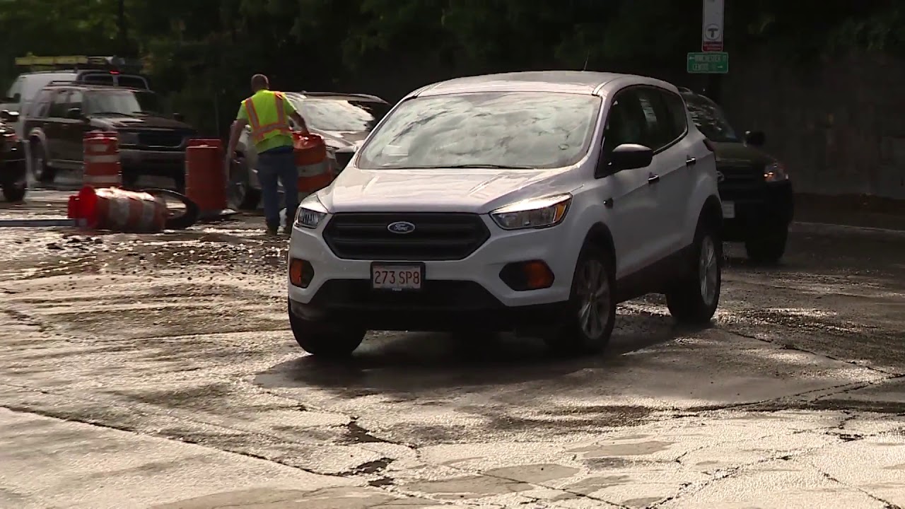 Water main break transforms Newton street into River - YouTube