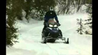 Snowmobile Studs Will Help on an Icy Hill - Snowmobile on icy hill