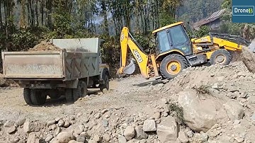 JCB Backhoe Loader-Loading River Gravel on Dump Truck