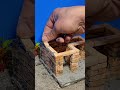 Comment construire une maison avec des briques miniatures ?