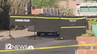 Woman found shot to death in car in west Phoenix
