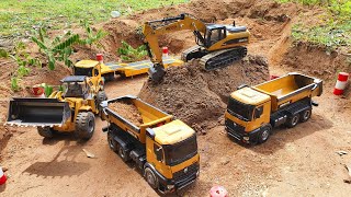 Rc construction Huina Excavator truck working at wheel loder