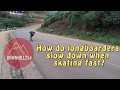 How do longboarders slow down when going fast?