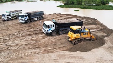 High Level Perfectly Work Operator Bulldozer Pushing Clearing Sand Dump Truck Unloading Sand