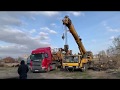 Выгрузка гусеничного трактора автокраном XCMG 50 тонн
