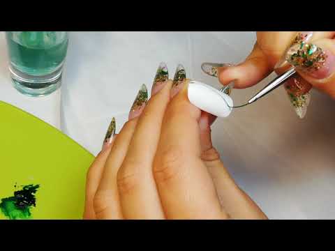 Video: Cum să pictezi pene pe unghii (cu imagini)