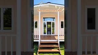 Light-pink walls, white porch, glass doors, garden.