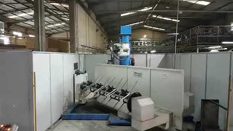 Suspended welding robot with two sides rival positioner