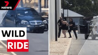 Woman arrested after erratic scenes on busy Munno Para road | 7NEWS