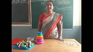 Stringing / Threading the beads activity for LKG