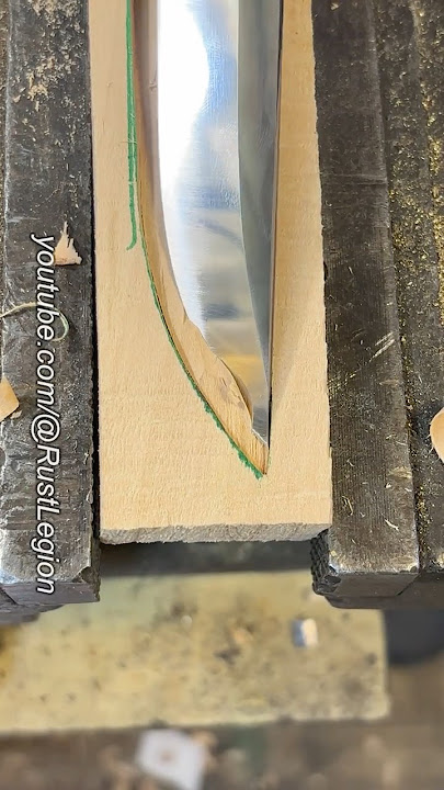 Leather sheath with wood liner