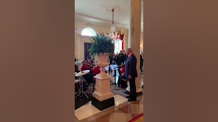 Trump conducts United States Marine Band as they play God Bless America