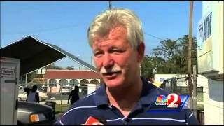 50 firefighters work to put out flames at tire warehouse