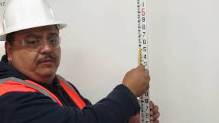 Reading an Engineers Rule by Operator Barraza