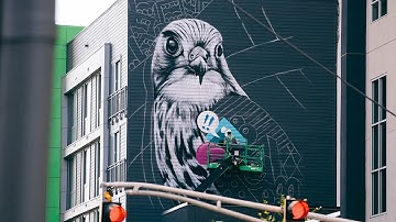 Artist GREG MIKE paints a 6 story building in Midtown, Atlanta